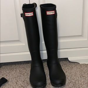 Matte black tall Hunter boots